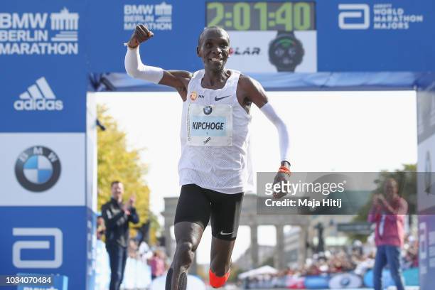 Eliud Kipchoge of Kenya crosses the finishing line to win the Berlin Marathon 2018 in a new world record time of 2:01:40 hours on September 16, 2018...