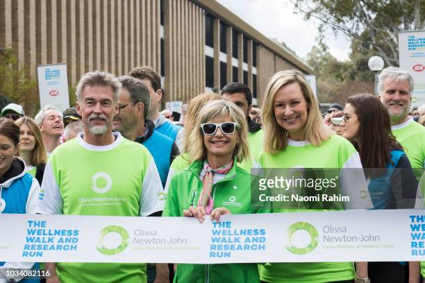 Olivia Newton-John , John Easterling and Melissa Doyle during the annual Wellness Walk and Research Run on September 16, 2018 in Melbourne,...