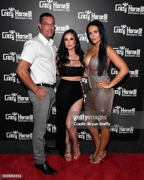 Dr. Chris Quinn, adult film actress Kendra Lust and Jenna Quinn attend Lust's birthday party celebration at Crazy Horse 3 Gentlemen's Club on...