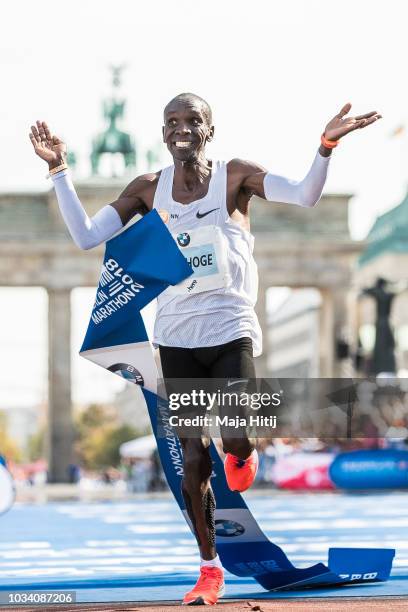 Eliud Kipchoge of Kenya celebrates after winning the Berlin Marathon 2018 in a new world record time of 2:01:39 on September 16, 2018 in Berlin,...