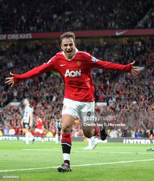 Dimitar Berbatov celebrates after he scored the opening goal during the Barclays Premier League match between Manchester United and Newcastle United...