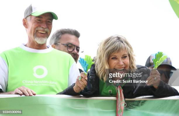 Olivia Newton-John and her husband John Easterling look on during the annual Wellness Walk and Research Runon September 16, 2018 in Melbourne,...