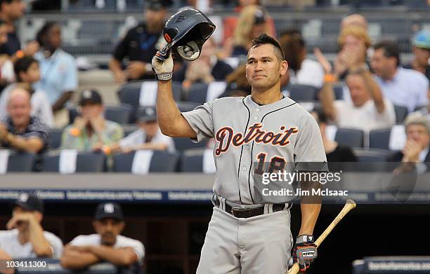 Johnny Damon of the Detroit Tigers salutes the crowd prior to his first at bat against the New York Yankees on August 16, 2010 at Yankee Stadium in...