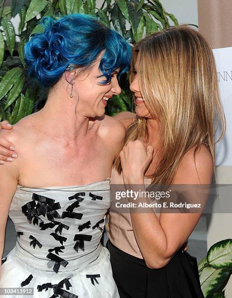 Actresses Juliette Lewis and Jennifer Aniston arrive at the premiere of Miramax's "The Switch" held at Arclight Hollywood at the Cinerama Dome on...