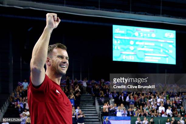 Leon Smith, Great Britain captain celebrates at the match point as Cameron Norrie of Great Britain wins his match against Sanjar Fayziev of...