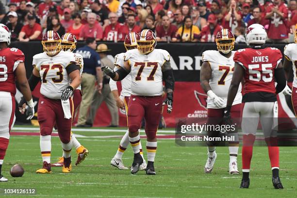 Chase Roullier, Shawn Lauvao and Trent Williams of the Washington Redskins walks to the line of scrimmage during a game against the Arizona Cardinals...