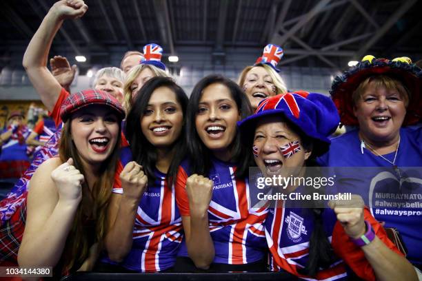 Great Britain fans celebrate as the Great Britain team beat the Uzbekistan team in the World Group Play Off during day three of the Davis Cup by BNP...