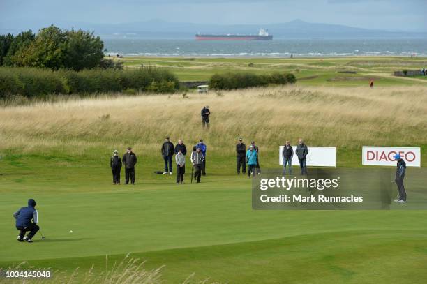 Gary Orr of Scotland, Paul Streeter of England and David Shacklady of England on the 9th green together during Day Three of the Scottish Senior Open...