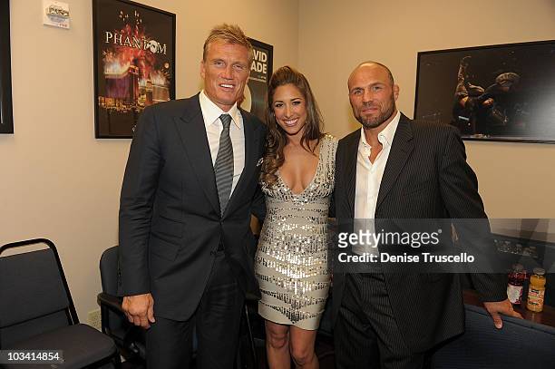Dolph Lundgren, Giselle Itie and Randy Couture attend the pre-party for the special screening of The Expendables at Planet Hollywood Resort & Casino...