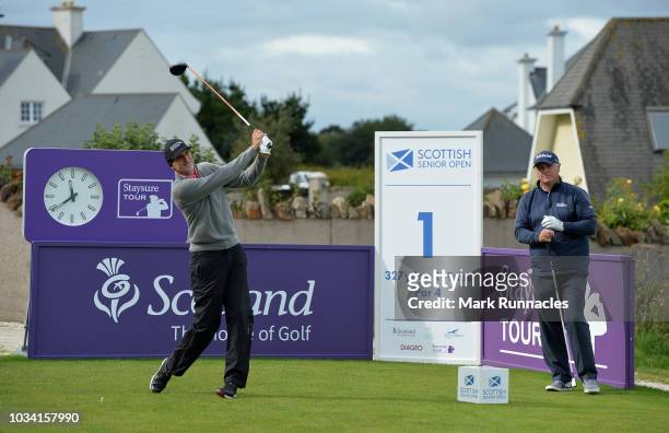 Andre Bossert of Switzerland plays his tee shot to the 1st hole during Day Three of the Scottish Senior Open at Craigielaw Golf Club on September 16,...