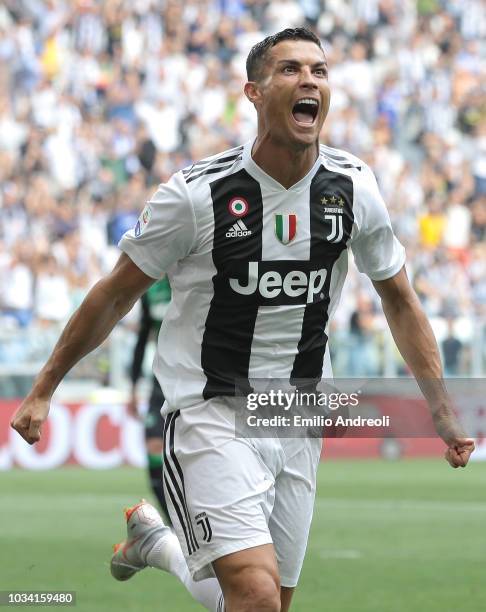 Cristiano Ronaldo of Juventus FC celebrates after scoring the opening goal during the serie A match between Juventus and US Sassuolo at Allianz...