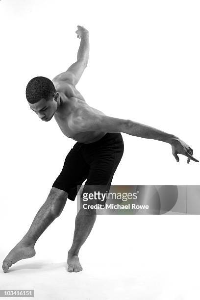 young male in dancer position - jazz dancing stock pictures, royalty-free photos & images