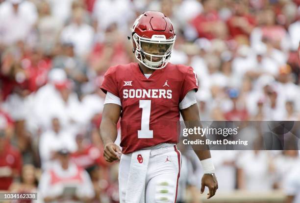 Quarterback Kyler Murray of the Oklahoma Sooners walks on the field during the game against the UCLA Bruins at Gaylord Family Oklahoma Memorial...