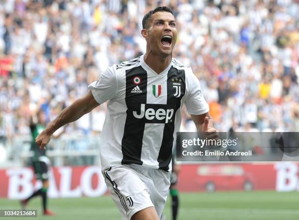 Cristiano Ronaldo of Juventus FC celebrates after scoring the opening goal during the serie A match between Juventus and US Sassuolo at Allianz...