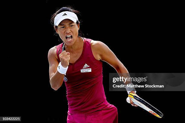 Kimiko Date Krumm of Japan celebrates a point against Monica Miculescu of Romania during the Rogers Cup at Stade Uniprix on August 17, 2010 in...