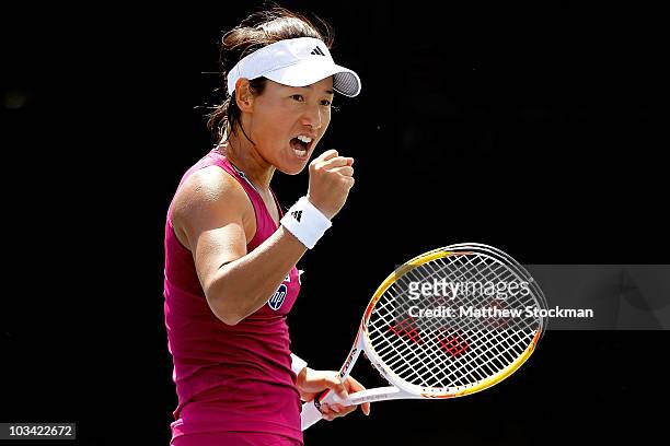 Kimiko Date Krumm of Japan celebrates a point against Monica Miculescu of Romania during the Rogers Cup at Stade Uniprix on August 17, 2010 in...