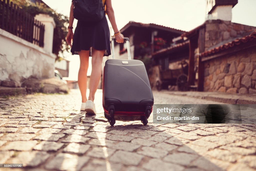 Tourist woman traveling around Europe