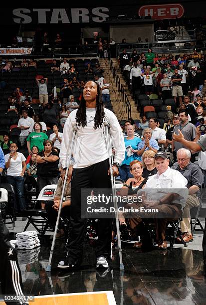 Chamique Holdsclaw of the San Antonio Silver Stars sits on the side due to an injury during the game against the Washington Mystic on August 17, 2010...