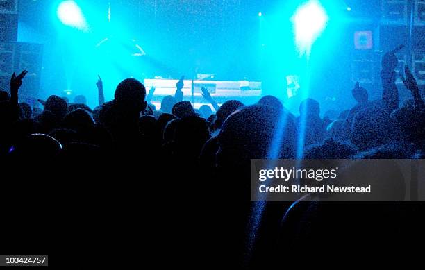 crowd at a rave - nightclub dj stock pictures, royalty-free photos & images