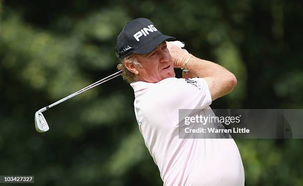 Miguel Angel Jimenez of Spain plays his second shot into the 18th green during the Pro-Am of the Czech Open 2010 at Prosper Golf Resort on August 18,...