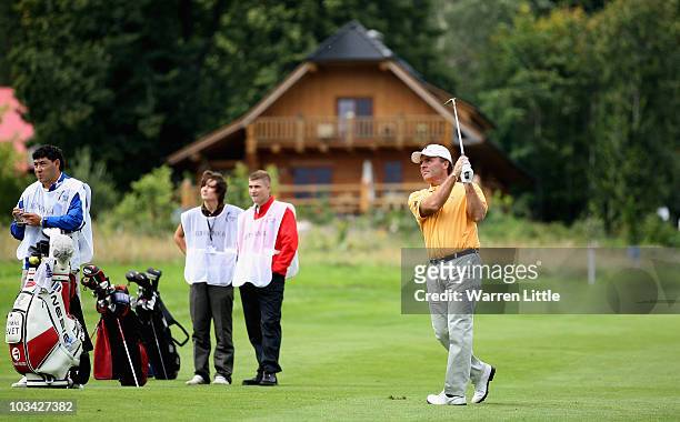 Thomas Levet of France is watched by some young caddies during the Pro-Am of the Czech Open 2010 at Prosper Golf Resort on August 18, 2010 in...