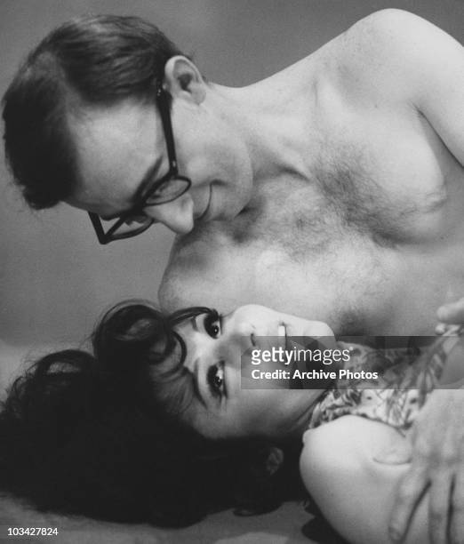 American actor, comedian and director Woody Allen and fellow star of 'What's New Pussycat' Paula Prentiss in 1965.