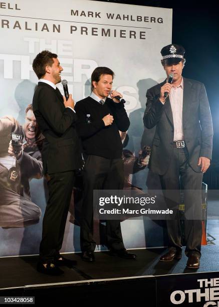 Actors Mark Wahlberg and Will Ferrell being interviewed by Darren McMullen at the Australian premiere of 'The Other Guys' during the Australian...