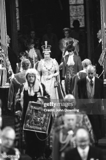 Queen Elizabeth II, with Princess Diana , walks through the Palace of Westminster during the State Opening of Parliament on November 06, 1984.