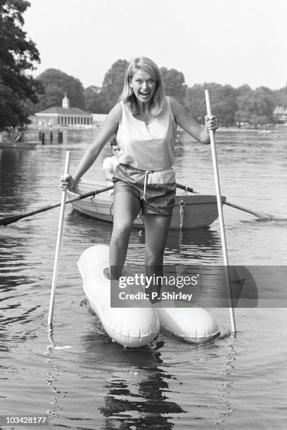 Anneka Rice presenter of British television show 'Treasure Hunt' walks on water on August 27, 1984.