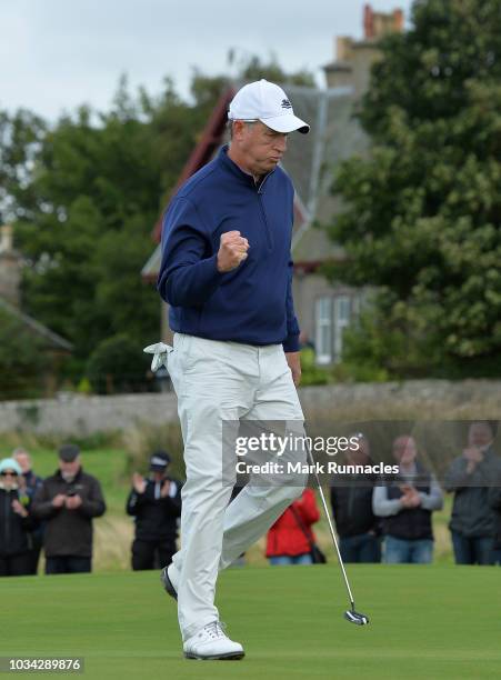 Gary Orr of Scotland celebrates after sinking his final putt on the 18th as he wins the Scottish Senior Open during Day Three of the Scottish Senior...