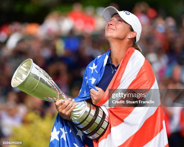 Angela Stanford of USA looks to the sky whilst hilding the winner trophy after the final round of The Evian Championship at Evian Resort Golf Club on...