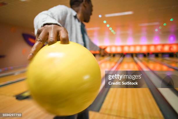 ein senior woman ten pin bowling - bowler hat stock-fotos und bilder