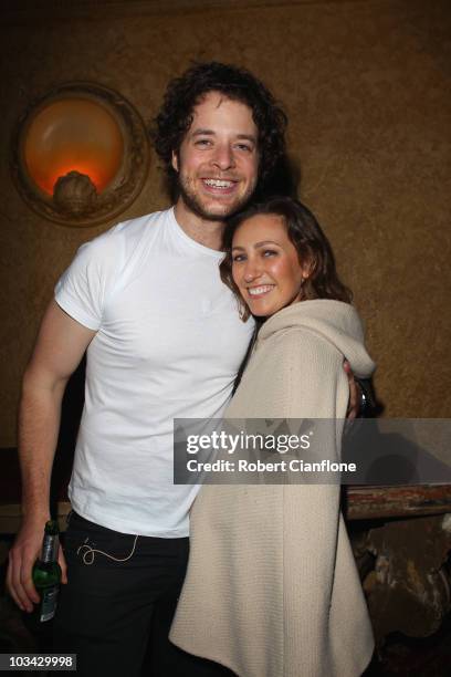 Hamish Blake poses with girlfriend Zoe Foster after the Frank Stallone concert at The Forum Theatre on August 18, 2010 in Melbourne, Australia....