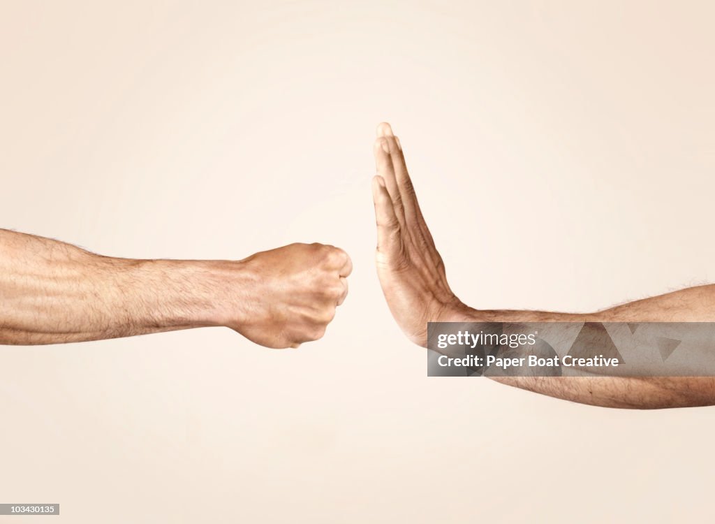 Hands symbolizing defensive and offensive force