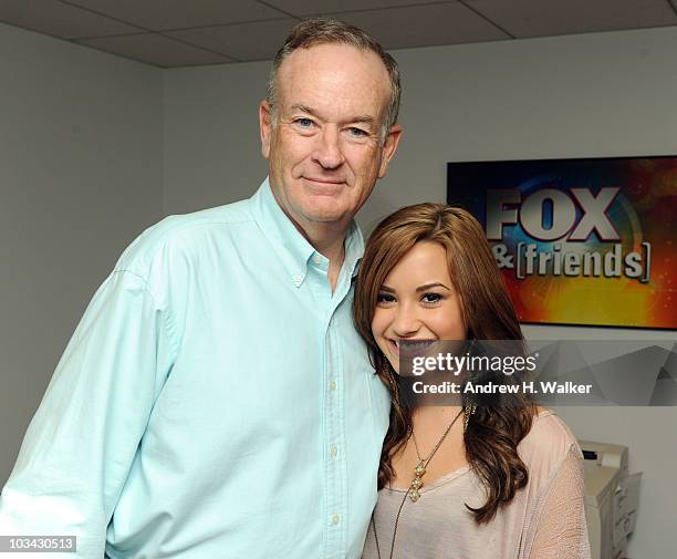 Personality Bill O'Reilly and singer Demi Lovato visit "FOX & Friends" at the FOX studios on August 18, 2010 in New York City.