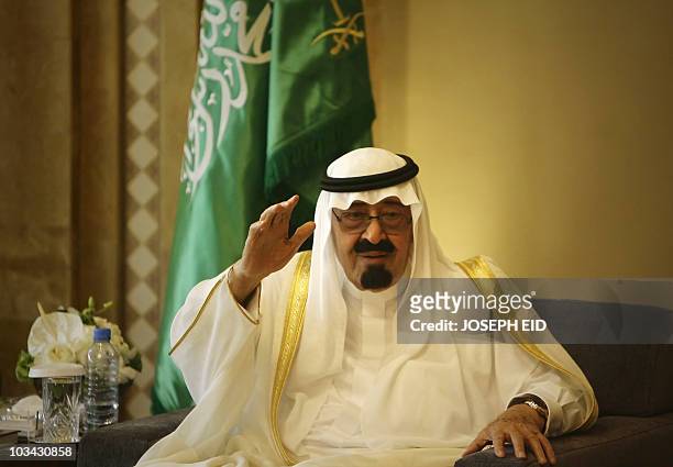 Saudi King Abdullah bin Abdel Aziz gestures during his meeting with Lebanese Prime Minister Saad Hariri at his residence in dowtown Beirut on July...