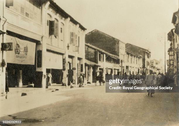 Chinese street at Penang, Malaysia, circa 1929.