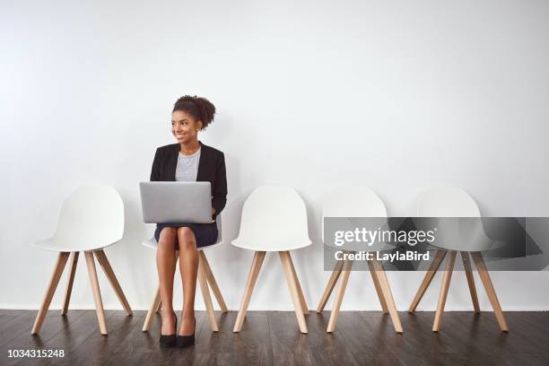 her positivity is sure to impress her interviewers - waiting concept stock pictures, royalty-free photos & images