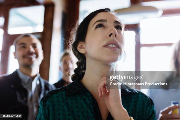 customers looking at specials on menu - woman waiting in line stock pictures, royalty-free photos & images