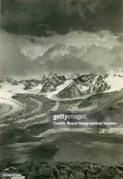 The source of the great Kangshung glacier - the top of Mount Everest just appears above the clouds, The source of the great Kangshung glacier, Tibet...