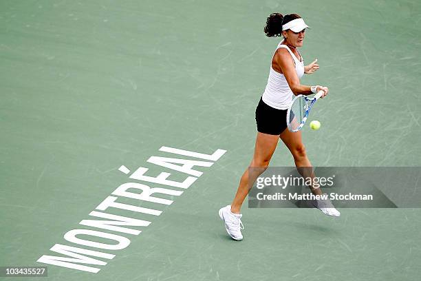 Agnieszka Radwanska of Poland returns a shot to Vania King of the United States during the Rogers Cup at Stade Uniprix on August 18, 2010 in...