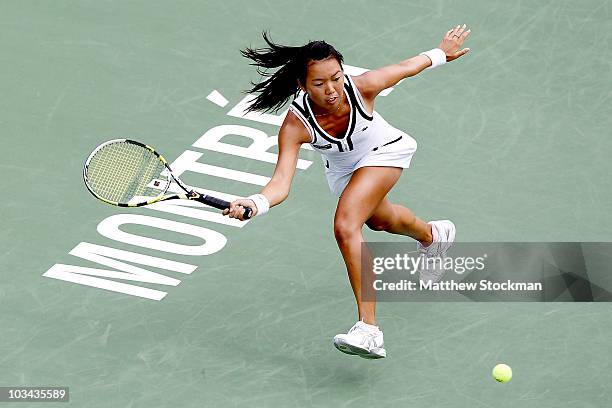 Vania King of the United States returns a shot to Agnieszka Radwanska of Poland during the Rogers Cup at Stade Uniprix on August 18, 2010 in...