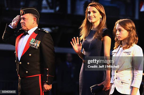 King Abdullah II bin al-Hussein and Queen Rania and Princess Iman of Jordan attend the Royal Military Tattoo at Edinburgh Castle on August 18, 2010...