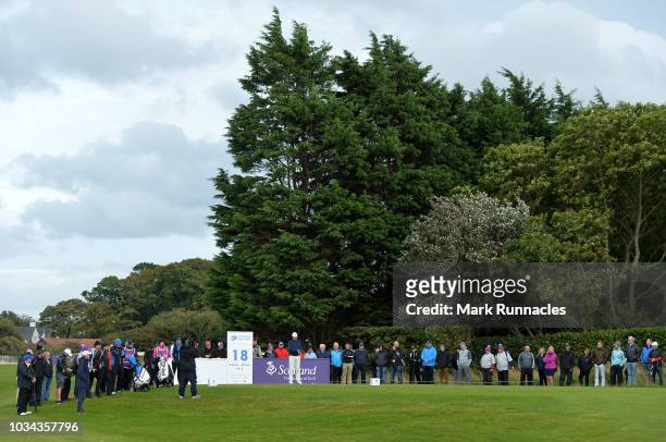Gary Orr of Scotland plays his tee shot at the 18th hole during Day Three of the Scottish Senior Open at Craigielaw Golf Club on September 16, 2018...