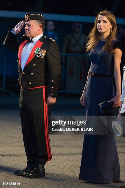 Jordan's King Abdullah II , and his wife Queen Rania arrive to attend the The Royal Edinburgh Military Tattoo, at Edinburgh Castle, in Edinburgh on...