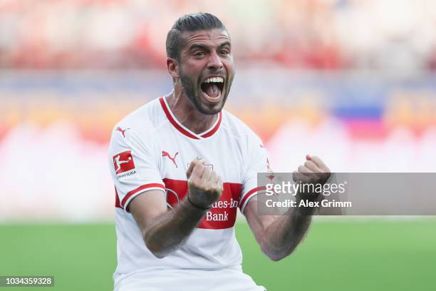 Emiliano Insua of Stuttgart celebrates his team's first goal during the Bundesliga match between Sport-Club Freiburg and VfB Stuttgart at...