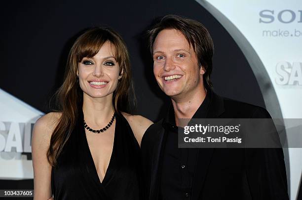 Actress Angelina Jolie and actor August Diehl attend the german premiere of 'Salt' at cinema Cine Star Potsdamer Platz on August 18, 2010 in Berlin,...