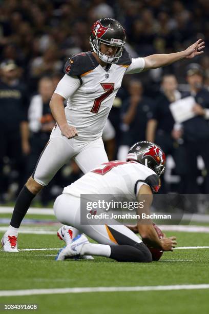 Chandler Catanzaro of the Tampa Bay Buccaneers kicks the ball during a game against the New Orleans Saints at the Mercedes-Benz Superdome on...