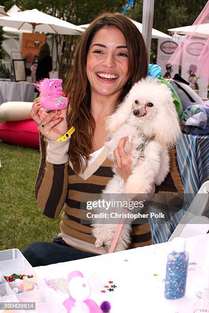 Emmanuelle Vaugier decorates pink ducks to benefit the Munchkin's Project Pink Breast Cancer Awareness Campaign to benefit the Susan G. Komen...