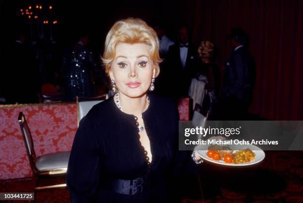 Actress Zsa Zsa Gabor attends the wedding of her ex-Husband George Sanders to her sister Magda Gabor on December 4 1970 in Los Angeles, California.